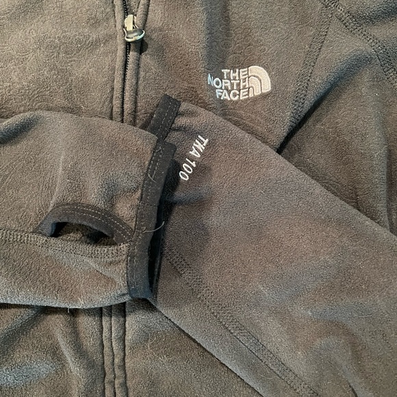North face Small, embossed pattern, black fleece, front pockets with hood. - Picture 6 of 15